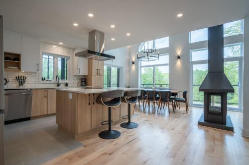 New Construction - Spa & Pool Table - Le Foresti in Saint-Alphonse-Rodriguez (QC)