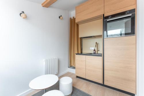 Le Petit Canut - T1 sous les toits avec vue - image 5