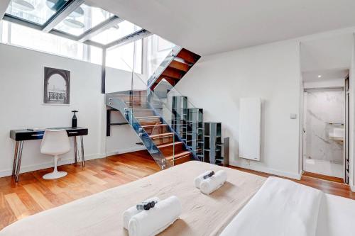 Appartement de luxe sous verrière en plein coeur du Marais