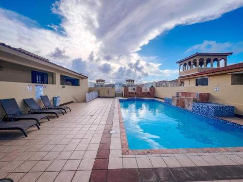 Your Ocean View Oasis in Palmas Del Mar with Pool Access in Humacao