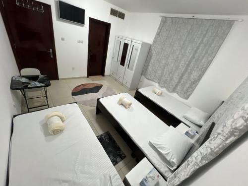 ALEX Hostel - Bed in shared room - C2602 in Шарджа