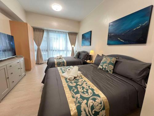 Casa Haraya Urban Stays - Walking Distance to NAIA Terminal 3 Newport City Condo with 500mbps WIFI and free Netflix access, Manila