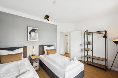 NASA Homes I Moderne City Suite I Zentral I 3 Zimmer I Balkon und Aufzug I neu renoviert I Smart TV I Hotelbetten in Bad Bevensen, Deutschland