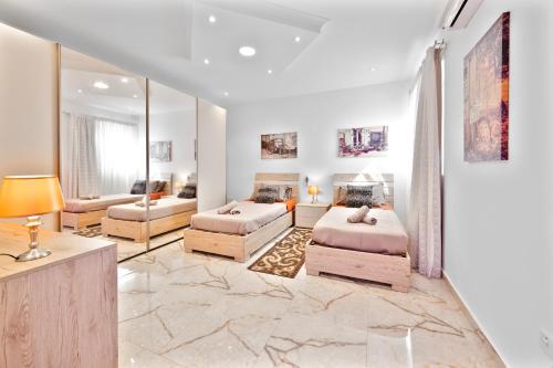 XC4 - PENTHOUSE, 3 bedroom, Modern, Designer - Attard in แอตตาด