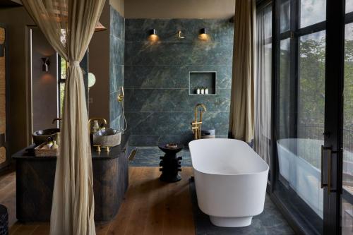 Bathroom, Bupenyu Lodge by NEWMARK in Dete