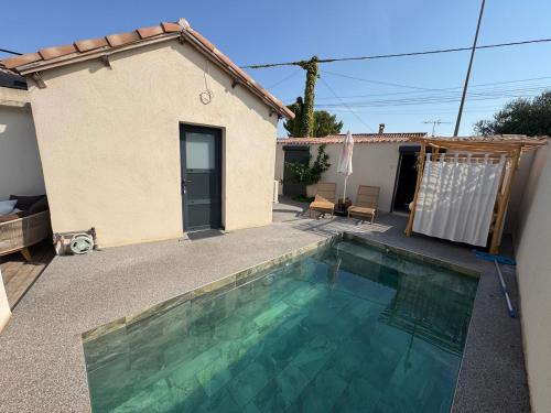 DIGITONE BY GATES Studio cosy pour 4 sans jacuzzi ni rooftop in Marignane
