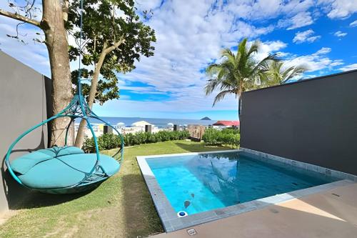 Casas Paradiso - Praia de Camburi - Refúgio do Pôr do Sol Casa Exclusiva Pé na Areia – khách sạn tại Praia de Camburi