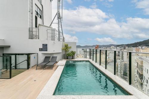 The Bridge by Viva - Predio com piscina no terraco e academia em Floripa in Florianopolis