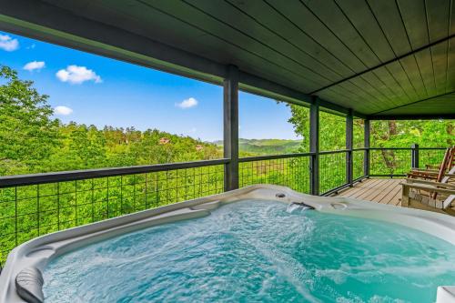 The Treehouse Sleep 12 Hot Tub Firepit Game Room in Wears Valley (TN)