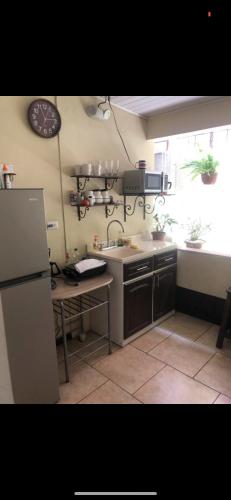 Kitchen, #2 private room close to airport in Carmen
