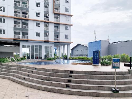 RedDoorz Plus @ Suncity Residence Apartemen Sidoarjo near Puskesmas Urangagung