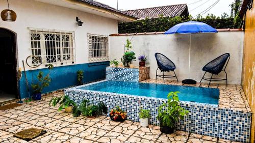 Casa de praia com piscina e área externa gourmet – khách sạn tại Nova Mirim