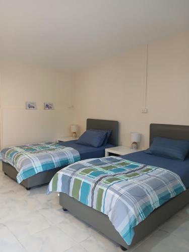 บ้านในสวนรีสอร์ทBannnaisuan Resort Room Type - Deluxe Twin Room