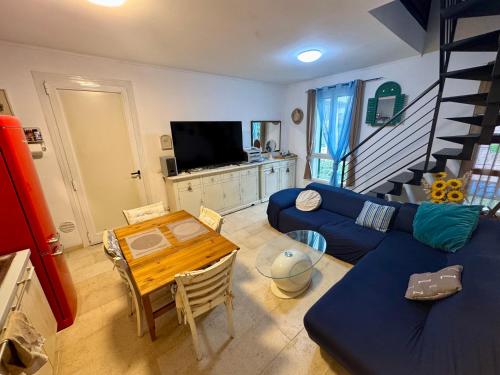 Skupni salon/TV območje, Villa San Cataldo Stanza con Bagno in Appartamento in Emilia Ovest