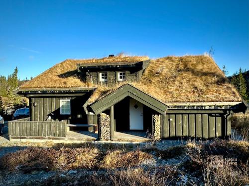 Cabin in magnificent landscape and hot tub inside