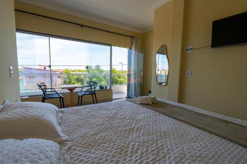 Suítes Oásis (Suites Oasis) in Guamare