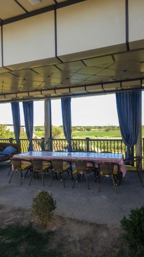A country villa on the river bank in Chirchik