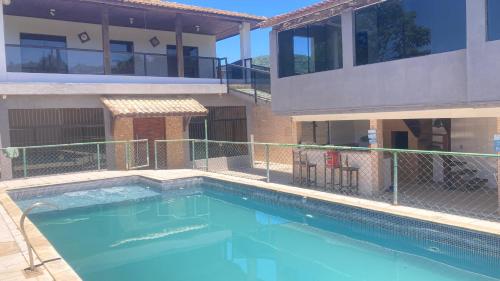 Casa 5 suítes, piscina, churrasqueira, sinuca – khách sạn tại Enseada