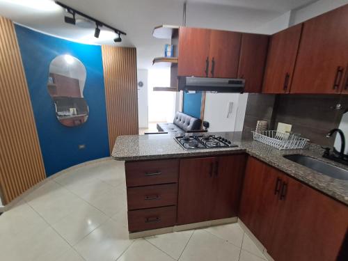 Apartaestudio equipado, parking y workspace