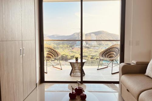 Loft de lujo con jacuzzi vista al mar y la sierra