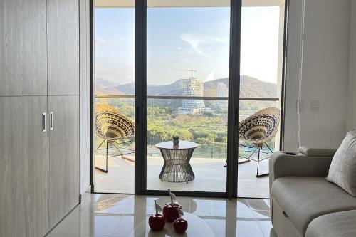 Loft de lujo con jacuzzi vista al mar y la sierra