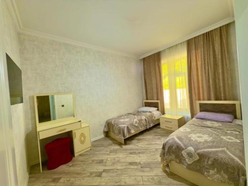 Qax home in Qax