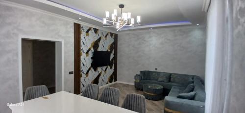 Qax home in Qax
