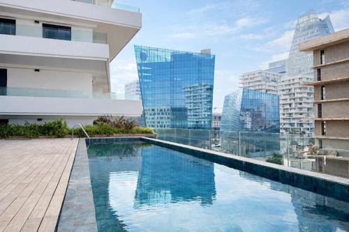 Appartement Uptown CFC - Piscine - Gym - Parking Gratuit – khách sạn tại El Oulfa