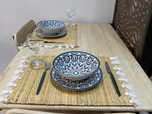 Bel appartement piscine,10 min souk, plage, bein sport in Al Mohammadi