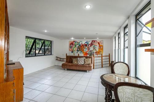 Shared lounge/TV area, Mansao Rio: Vista linda, Piscina, 8 Hospedes in Cosme Velho