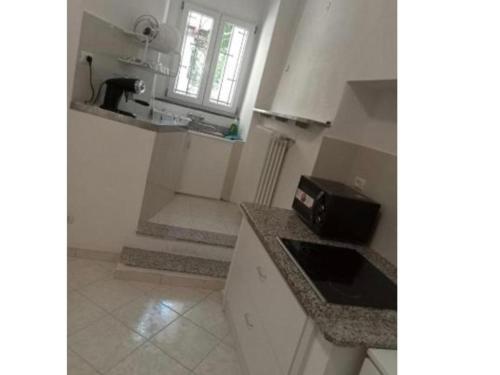 廚房, Fiore Apartments in 菲奧倫佐拉達爾達