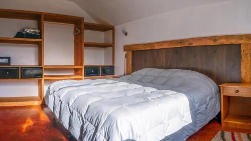 Cabañas Martina Bungalows con vista a volcanes l Frente al Lago Llanquihue l Piscina temperada y tinaja TV y WiFi l Hasta 6 personas