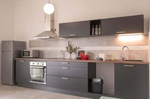 кухня, Résidence appartement proche Disneyland (Residence appartement proche Disneyland) in La Ferte-sous-Jouarre