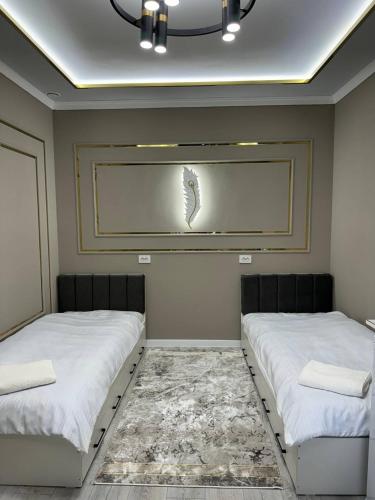 Qonaq House недалеко от мавзолея Ясави – khách sạn tại Turkistan