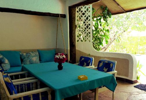 Frangipani Cottages photo