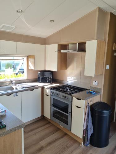 מטבח, Stacaravan 161 camping Bongerd 5 sterren Gezin 5 personen in שאגן