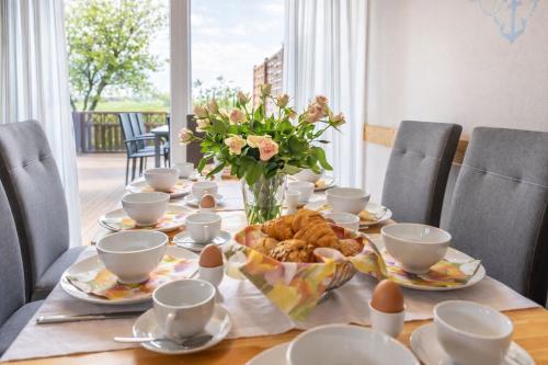 Haus Lüttje Hörn Wohnung Sonne in Schillig, Deutschland