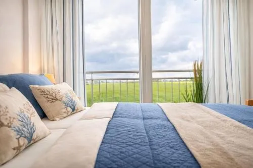 Haus Lüttje Hörn Wohnung Strand in Schillig, Deutschland