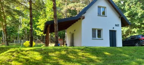 Warmia Forest House - Pod koronami drzew in Kierzliny