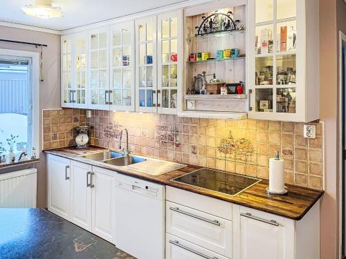 Kitchen, Holiday Home Villa Daniel by Interhome in Storebro