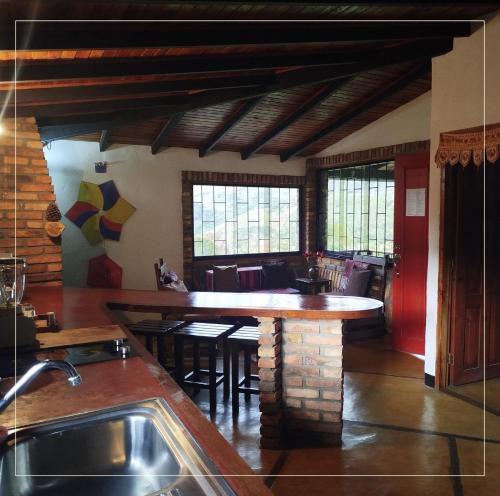 Kitchen, Inn Casa Blanca in Tabay