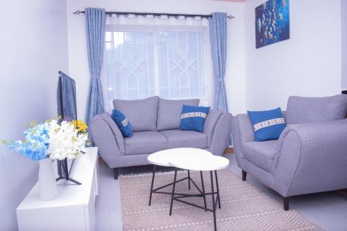 Marvel Homes - Pumzika Modern 1BR Fast WiFi Balcony Near Town Perfect for Work & Stay – khách sạn tại Kaathene