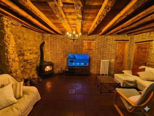 Koplietošanas atpūtas telpa ar TV, Casa rural El Herrero in Cidones