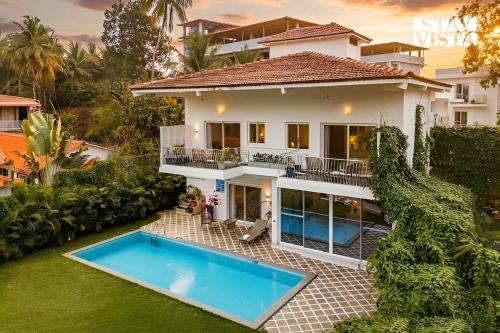 Aroha Palms Serenity with Private Pool, Wi-Fi, Mandrem