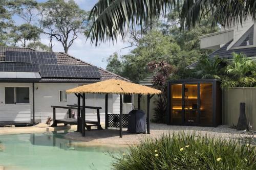 Waterfront Oasis Lakefront Villa with Pool and Sauna in Lake Munmorah