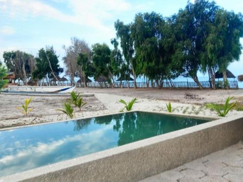 View, Villa avec piscine et pieds dans l'eau in Palmarin