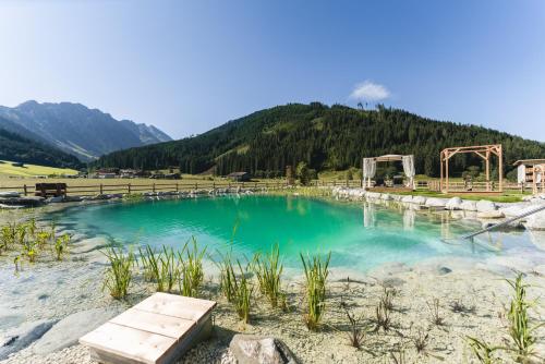 Traumhotel Alpina - 4 Sterne Superior Luxushotel, hoteleigenen Badesee, Adults Only in Gerlos, Österreich
