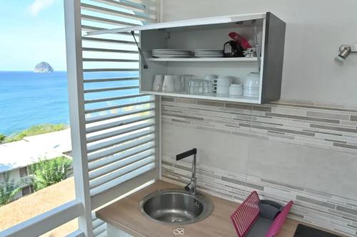Appartement charmant au Diamant 30 m² avec vue mer in เลอ ยามัน