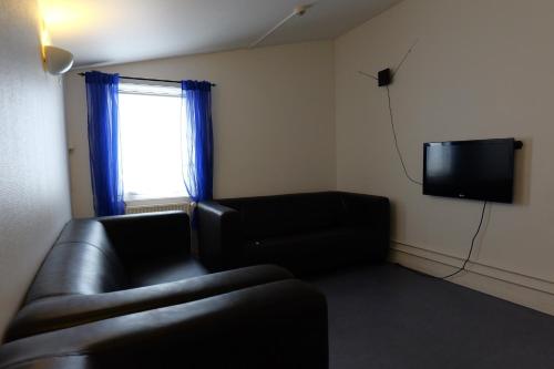 Delt lounge/TV-område, Kammak Hostel Sisimiut in Sisimiut