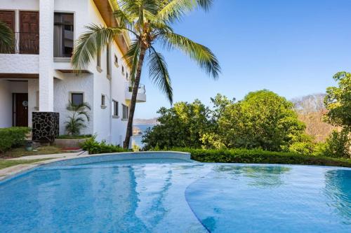 Piscina, 2BR, Luxury Escape with Pool, Balcony and Views in Playa Flamingo